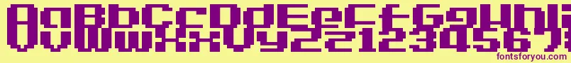 LvdcGameOver2-fontti – violetit fontit keltaisella taustalla