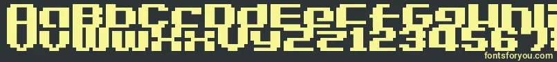LvdcGameOver2-fontti – keltaiset fontit mustalla taustalla