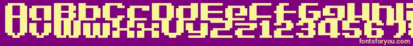 LvdcGameOver2-fontti – keltaiset fontit violetilla taustalla