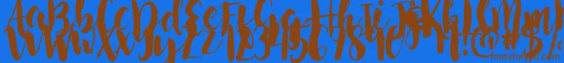 NightingaleSample-Schriftart – Braune Schriften auf blauem Hintergrund