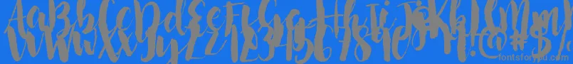 NightingaleSample-Schriftart – Graue Schriften auf blauem Hintergrund