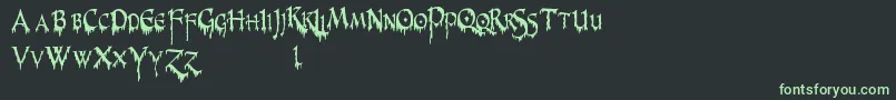 PrUncialCreepyNarrow Font – Green Fonts on Black Background