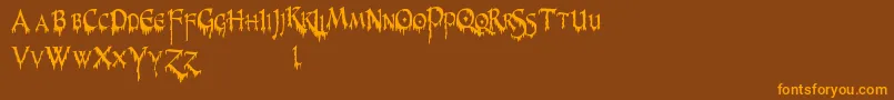 PrUncialCreepyNarrow Font – Orange Fonts on Brown Background