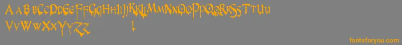 PrUncialCreepyNarrow Font – Orange Fonts on Gray Background