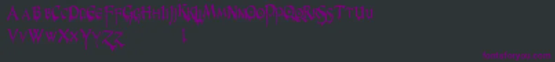 Czcionka PrUncialCreepyNarrow – fioletowe czcionki na czarnym tle