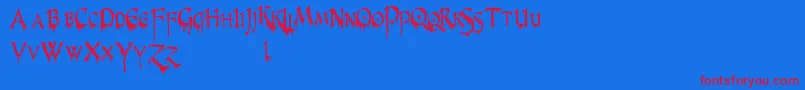 PrUncialCreepyNarrow Font – Red Fonts on Blue Background