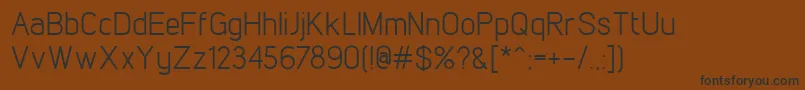 LintelRegular-Schriftart – Schwarze Schriften auf braunem Hintergrund