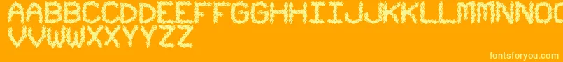 UrbanTribalStf-Schriftart – Gelbe Schriften auf orangefarbenem Hintergrund