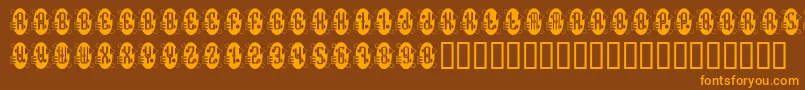 Decorette-Schriftart – Orangefarbene Schriften auf braunem Hintergrund