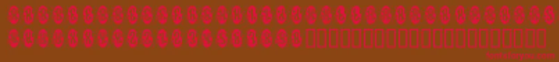 Decorette-Schriftart – Rote Schriften auf braunem Hintergrund