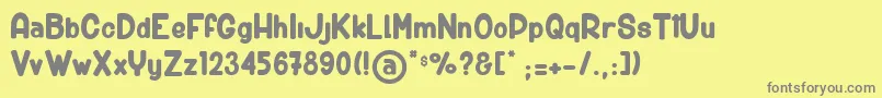 BigCarShortGun Font – Gray Fonts on Yellow Background