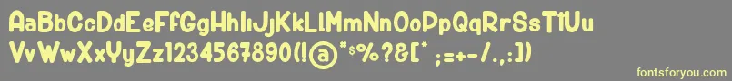 BigCarShortGun Font – Yellow Fonts on Gray Background