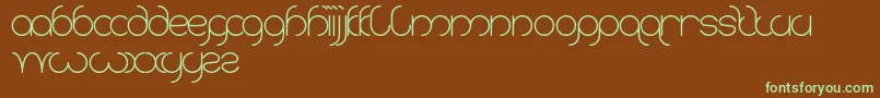 フォントKaritza – 緑色の文字が茶色の背景にあります。