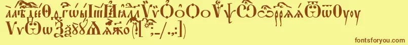 フォントStarouspenskayaUcs – 茶色の文字が黄色の背景にあります。