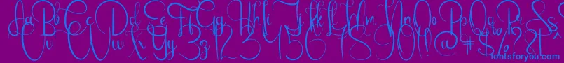 EmanuelaBold-Schriftart – Blaue Schriften auf violettem Hintergrund