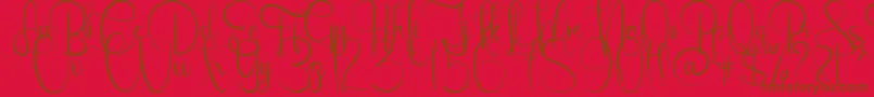 EmanuelaBold-Schriftart – Braune Schriften auf rotem Hintergrund