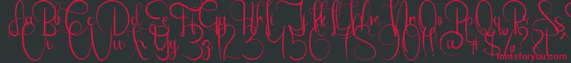 EmanuelaBold Font – Red Fonts on Black Background