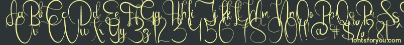 EmanuelaBold Font – Yellow Fonts on Black Background
