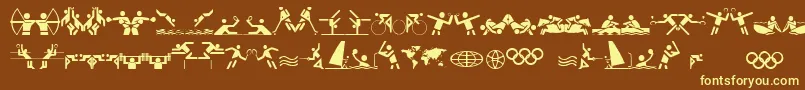 OlympiconsRegular-fontti – keltaiset fontit ruskealla taustalla