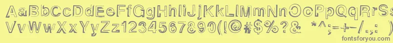 フォントAlphaseventeen – 黄色の背景に灰色の文字