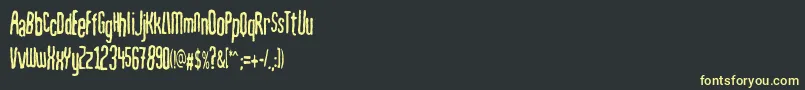 フォントMahrpedigsans – 黒い背景に黄色の文字