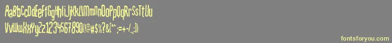 Mahrpedigsans-Schriftart – Gelbe Schriften auf grauem Hintergrund