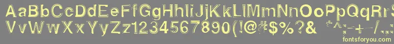 Alphasixteen Font – Yellow Fonts on Gray Background