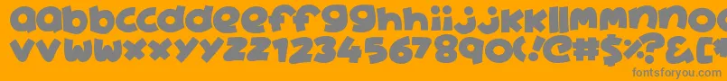 Aine-fontti – harmaat kirjasimet oranssilla taustalla