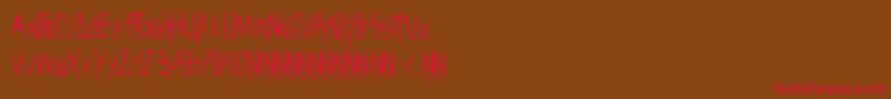 Cutthroatclawmarks-Schriftart – Rote Schriften auf braunem Hintergrund