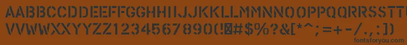 PfstampsproPaint-fontti – mustat fontit ruskealla taustalla