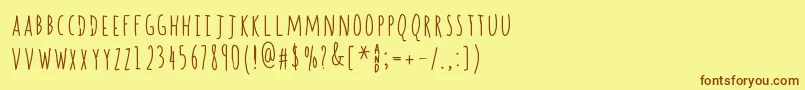 SpillBeans Font – Brown Fonts on Yellow Background
