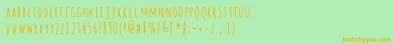 SpillBeans Font – Orange Fonts on Green Background