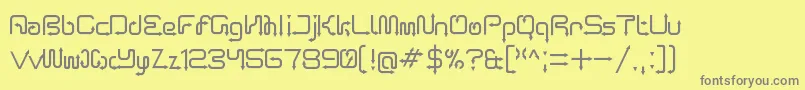 ArroTerminal-fontti – harmaat kirjasimet keltaisella taustalla