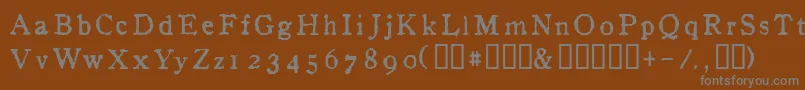 fuente InAlpha – Fuentes Grises Sobre Fondo Marrón