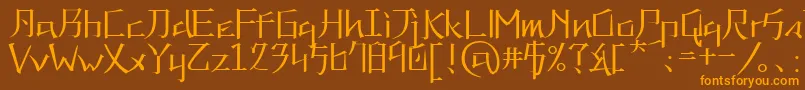 フォントKna – オレンジ色の文字が茶色の背景にあります。