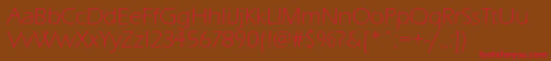 Eraslightc Font – Red Fonts on Brown Background