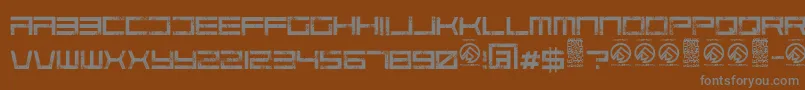 CodepredatorsRegular-fontti – harmaat kirjasimet ruskealla taustalla
