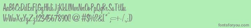 HoverRegularDb Font – Gray Fonts on Green Background