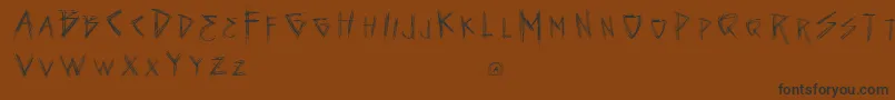 VtksSeven-Schriftart – Schwarze Schriften auf braunem Hintergrund