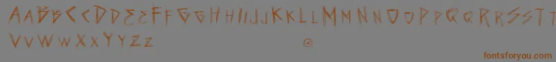 VtksSeven Font – Brown Fonts on Gray Background