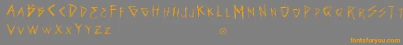 VtksSeven Font – Orange Fonts on Gray Background
