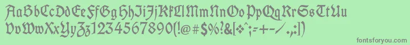 UnifrakturcookLight-Schriftart – Graue Schriften auf grünem Hintergrund