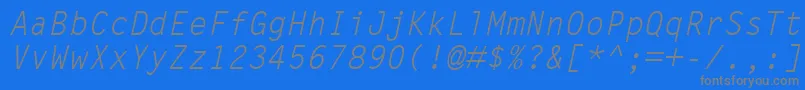 LetterGothicMtOblique-fontti – harmaat kirjasimet sinisellä taustalla