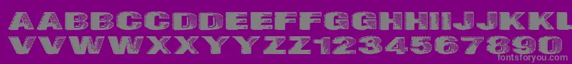 Badazzle Font – Gray Fonts on Purple Background