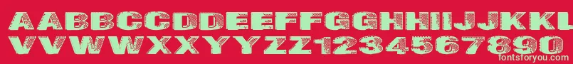 フォントBadazzle – 赤い背景に緑の文字