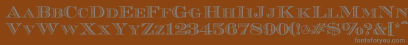 Ecuyerr0902-Schriftart – Graue Schriften auf braunem Hintergrund