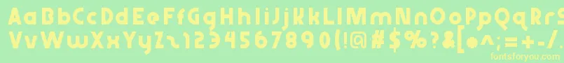 Abraxeousthin Font – Yellow Fonts on Green Background