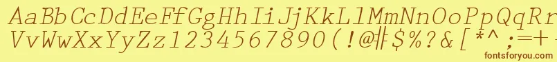 Fonte PrestigetwoRegularitalic – fontes marrons em um fundo amarelo