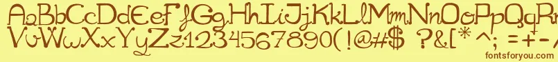Cuqueta Font – Brown Fonts on Yellow Background