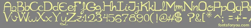 Cuqueta Font – Yellow Fonts on Gray Background